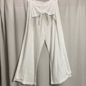 Gauzy wide leg Beach pants Size L white w self tie and faux flap detailing boho.